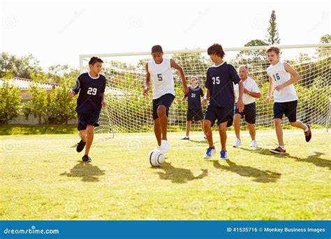 Members Of Male High School Soccer Playing Match Stock Photo Image Of