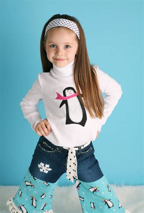 We have a wide assortment of cute children's clothing here! Cute Toddler Girl Modeling A Winter Penguin Outfit Stock ...