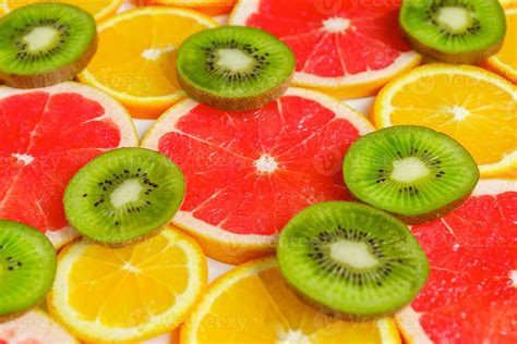 Citrus Slice Kiwi Oranges And Grapefruits On White Background Fruits