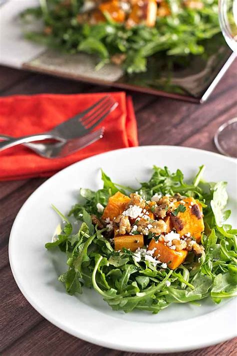 Roasted Sweet Potatoes And Arugula Salad With Feta Cheese And Candied