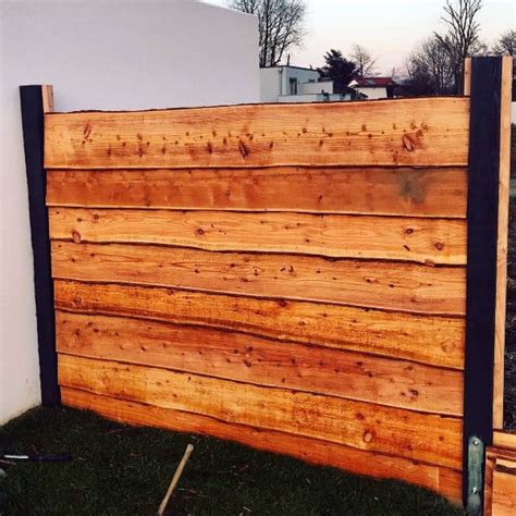 A basic privacy fence with a classic design can be seen in the above image. Top 70 Best Wooden Fence Ideas - Exterior Backyard Designs