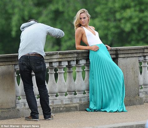 Kimberley Garner Poses In Plunging White Lycra Top And Floaty Skirt For