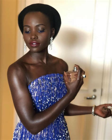 Lupita Nyongos Golden Globes 2019 Dress Was Made With 20000 Silver