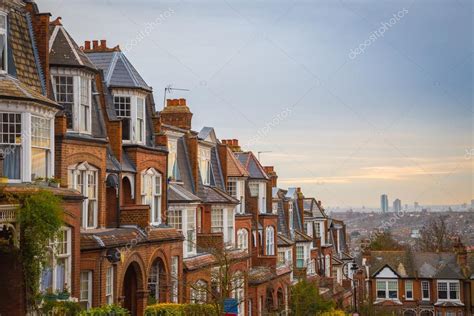 Traditional British Brick Houses On A Cloudy Morning With East London