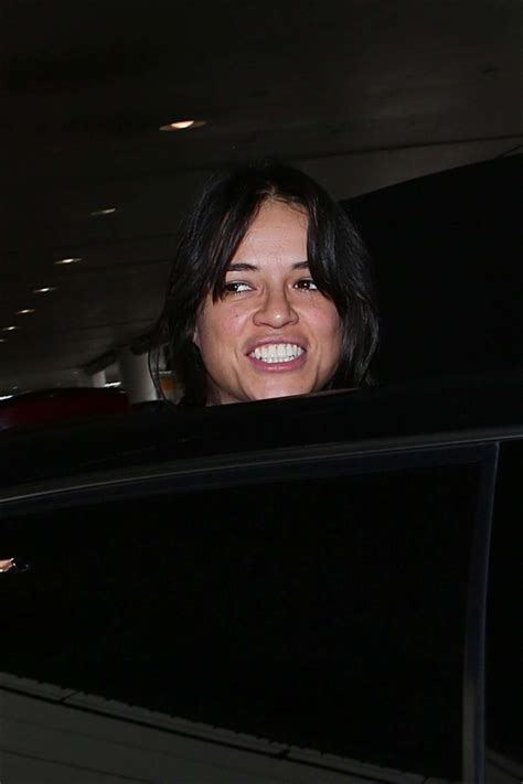 Michelle Rodriguez In White Jeans 03 Gotceleb Images And Photos Finder