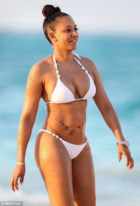 Mel B Shows Off Her Washboard Abs And Ample Curves In White Bikini