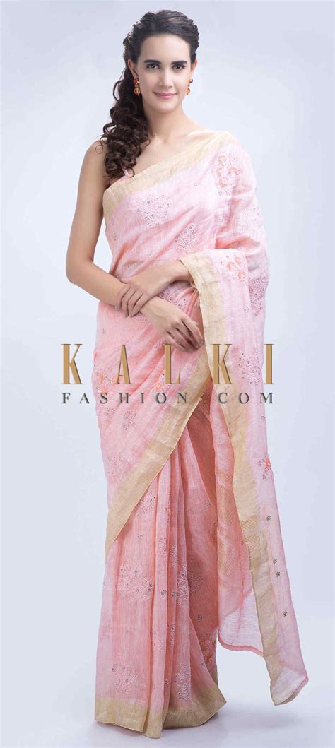 powder pink linen saree with floral embroidered butti only on kalki saree pink linen saree