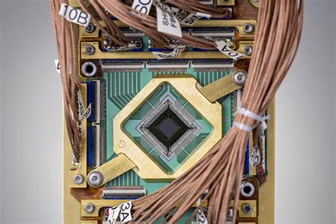 D Wave Quantum Computer Chip Image Eurekalert Science News Releases