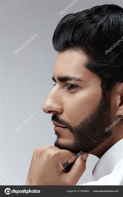 Short hairstyles are now more stylish than ever before. Beauty. Man With Hair Style And Beard Portrait. Handsome ...