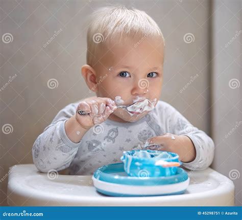 Baby Boy Eating Yogurt Stock Image Image Of Closeup 45298751