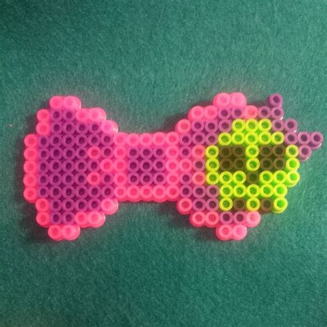 Place your beads on the pegboard as indicated. Skull Perler Bead Bow by MJistheBOMB on Etsy, $4.00 ...