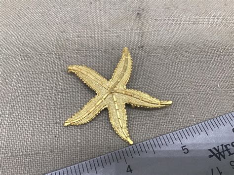 Gold Tone Starfish Pin