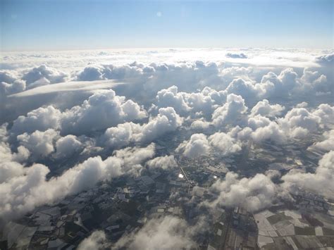 View Clouds Plane Top View 20 Inch By 30 Inch Laminated Poster With Bright Colors And Vivid