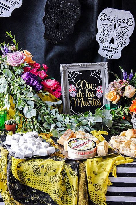 The candy sugar skulls are decorated with frosting and sometimes personalized with names. Kara's Party Ideas Day of the Dead Halloween Party | Kara ...