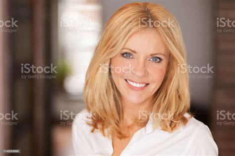 Mature Woman Smiling At The Camera She Relaxing At Home Beautiful Stock