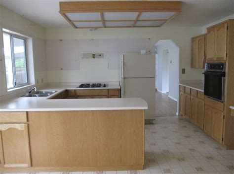 Brighten up your kitchen with more lighting, not whiter paint. Quality Cabinets: Maria's New White Kitchen - Maria Killam ...