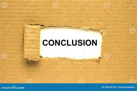 The Word Conclusion Appearing Behind Torn Brown Paper Stock Photo