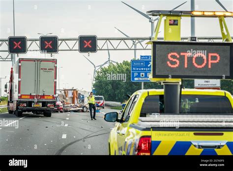HOUTEN, 11-07-21, Devastation after an accident with a car and caravan