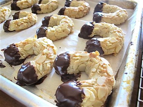 These genoan sweets are reminiscent of turkish and greek cookies. Chocoholic: Chocolate Dipped Almond Horns | Serious Eats