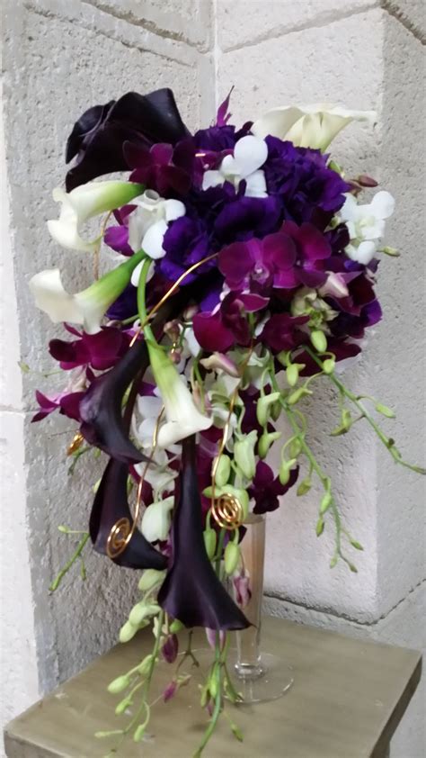 Filled With Eggplant And White Calla Lilies Dendrobium Orchids This