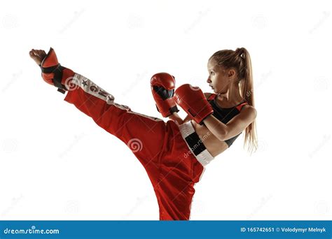 Young Female Kickboxing Fighter Training Isolated On White Background