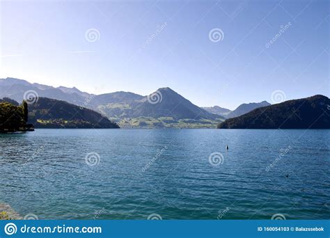 Landscape View From Vitznau Of The Beautiful Lake Lucerne From The Lake Shore Stock Image