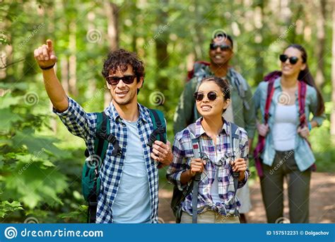 Group Of Friends With Backpacks Hiking In Forest Stock Image Image Of Outdoors Activity