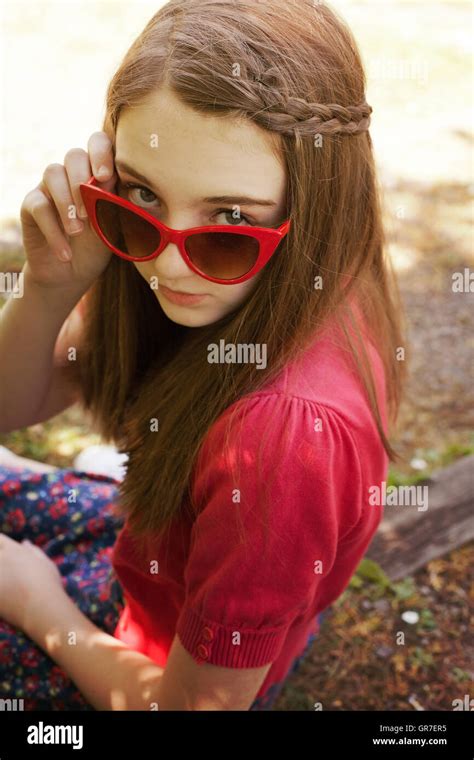 Beautiful Teenage Girl Wearing Red Retro Sunglasses Stock Photo Alamy