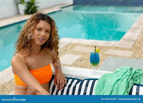Woman In Bikini Relaxing Near Swimming Pool In The Backyard At Home Stock Photo Image Of Home