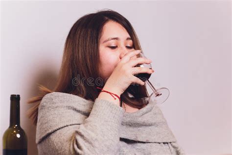 Beautiful Young Woman Drinking Wine At Home Stock Photo Image Of