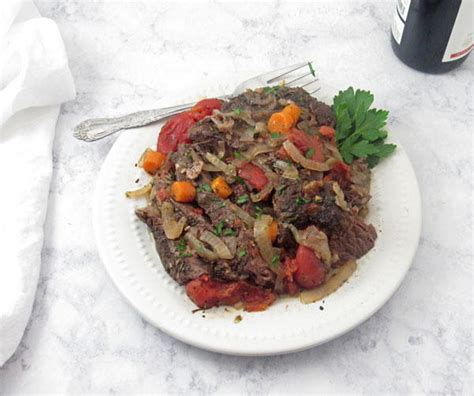 Adding italian herbs and tomatoes to a basic pot roast recipe enhances the flavors. Italian Pot Roast | RecipeLion.com