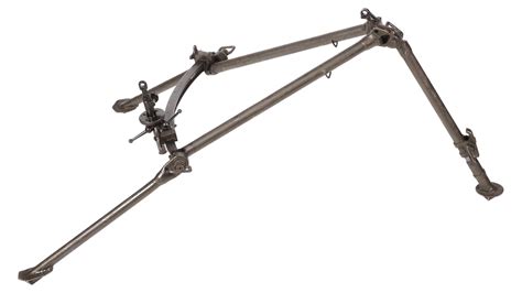 Two Machine Gun Tripods And Case Of Bren Magazines Rock Island Auction