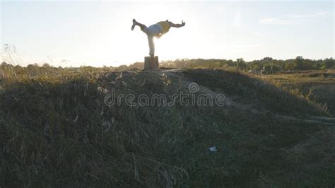 Young Sporty Man Standing At Yoga Pose Outdoor Caucasian Guy