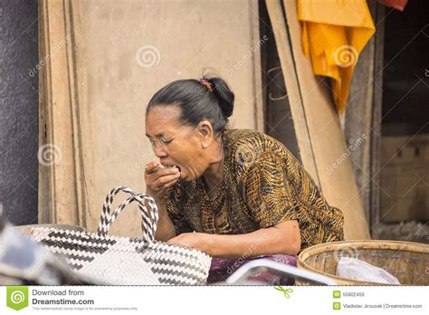 : Breakfast,woman at the Market, Village Toyopakeh, Nusa Penida June 24