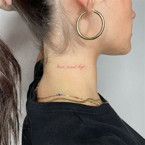 Love And Bye Lettering Tattoo On The Neck