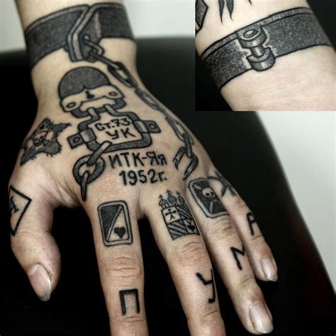 Фото тюремных наколок на пальцах узнай все о мире татуировок в тюрьме