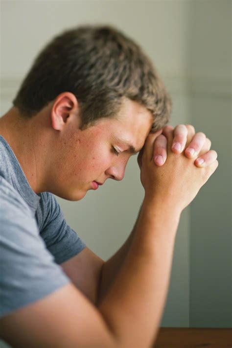 Young Man Prays