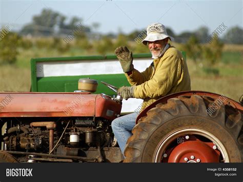 Happy Farmer On Tractor Image And Photo Bigstock