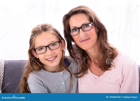 Mother And Daughter Wearing Eyeglasses Stock Photo Image Of Beauty
