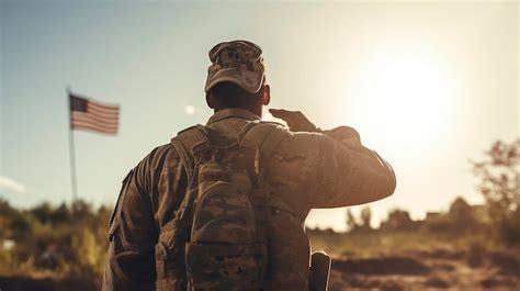 Premium Photo A Soldier Salutes The Flag Of The United States Of America