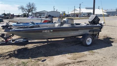 Only 250 original hours on boat and motor. 1990 18' Champion bass boat w/150 Johnson GT & trailer ...