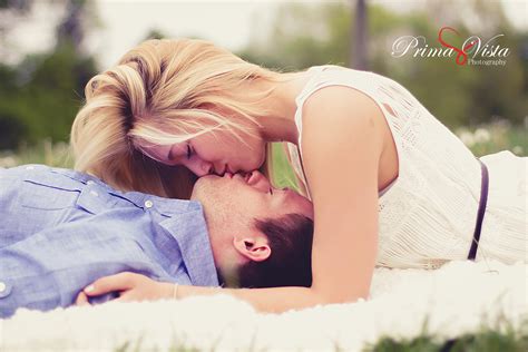 Laying Down On The Grass Kiss Cute Engagement Lik