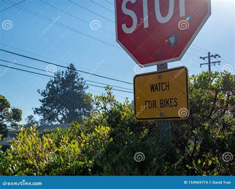Large Stop Sign With Notice For Watch For Bikes On Sign Stock Photo