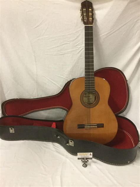 Sold At Auction Granada Classical Acoustic Guitar Made By Takamine Model No Tg006r With Hard Case