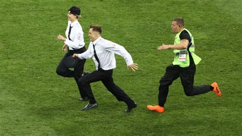 Why Feminist Rock Band Pussy Riot Invaded The Pitch During Fifa World Cup Final Condé Nast