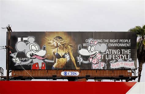 Oscar Nominated Graffiti Artist Banksy Spray Paints