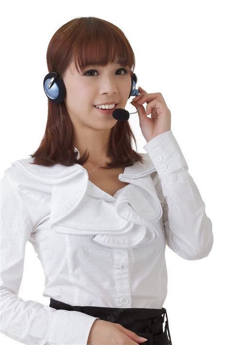 premium photo pretty asian secretary with headphone against white wall