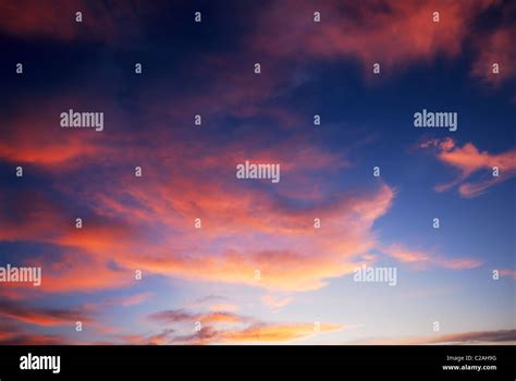 Dark Red Sunset Clouds And Deep Blue Sky Stock Photo Alamy