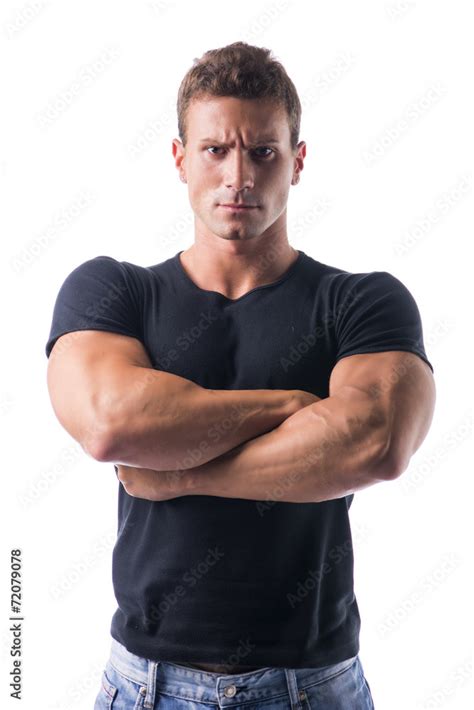 Muscled Man Crossing Arms With Serious Face Stock Photo Adobe Stock