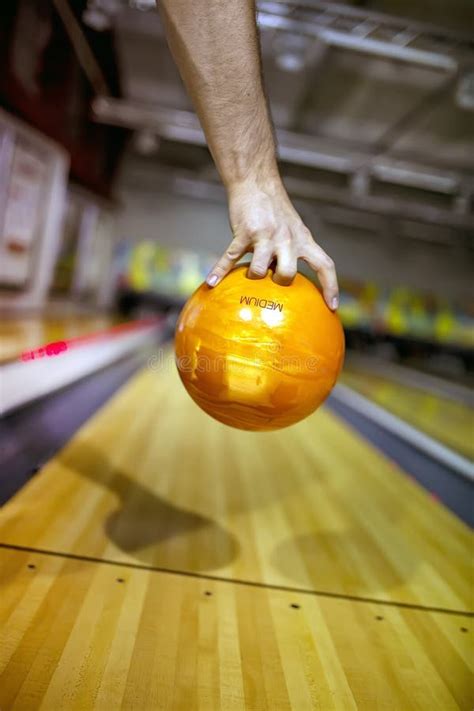 Bowling Ball At Hand Of Man Background Bowling Alley Editorial